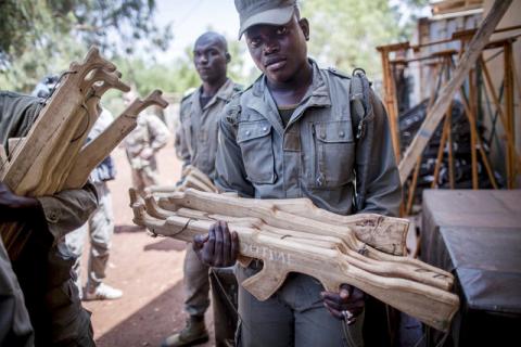 A Malian soldier carries mock weaponry for training during the visit of German Defence Minister Ursula von der Leyen (unseen) to the EUTM military training mission in Koulikoro, Mali, April 6, 2016. PHOTO BY REUTERS/Michael Kappeler