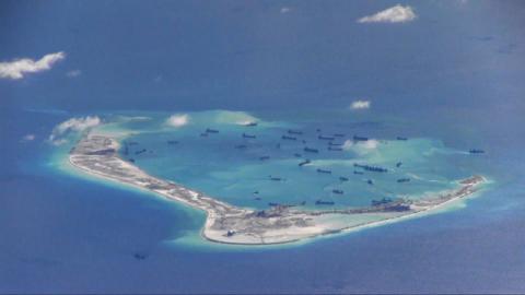 Chinese dredging vessels are purportedly seen in the waters around Mischief Reef in the disputed Spratly Islands in this still image from video taken by a P-8A Poseidon surveillance aircraft provided by the United States Navy, May 21, 2015. PHOTO BY REUTERS/U.S. Navy