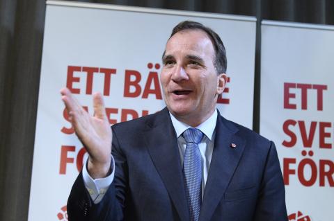 Swedish Social Democrat leader Stefan Lofven gestures during a news conference at the party headquarters in Stockholm