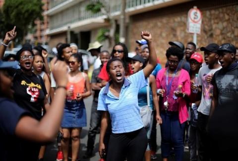 Students chant slogans during a protest demanding free education at the Johannesburg's University of the Witwatersrand, South Africa, October 12, 2016. PHOTO BY REUTERS/Siphiwe Sibeko