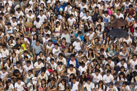 Students and teachers shout at a rally during the class boycott at the Chinese University of Hong Kong, in Hong Kong
