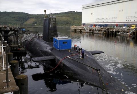 A nuclear submarine is seen at the Royal Navy's submarine base at Faslane, Scotland, Britain, August 31, 2015. PHOTO BY REUTERS/Russell Cheyne