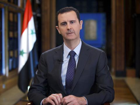 Syria's President Bashar al-Assad speaks during an interview with Venezuelan state television TeleSUR in Damascus
