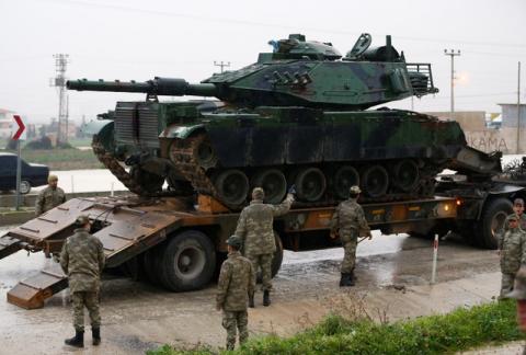 A Turkish military tanks arrives at an army base in the border town of Reyhanli near the Turkish-Syrian border in Hatay province, Turkey, January 17, 2018. PHOTO BY REUTERS/Osman Orsal