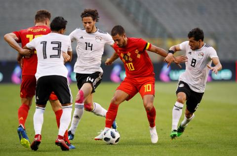 Belgium's Eden Hazard in action with Egypt's Tarek Hamed and Ramadan Sobhi. PHOTO BY REUTERS/Francois Lenoir