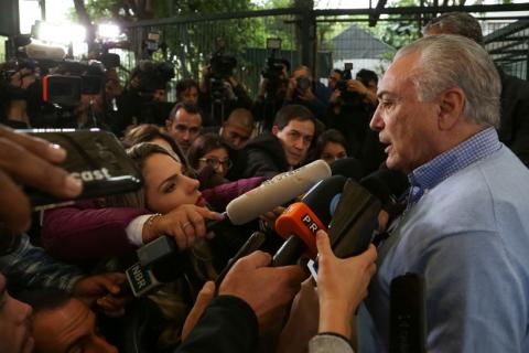 Brazil's President Michel Temer, talks with journalists after casting his vote in Sao Paulo, Brazil, October 7, 2018. PHOTO BY REUTERS/Marcos Correa/Brazilian Presidency