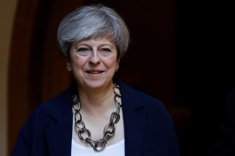 Britain's Prime Minister Theresa May leaves after a church service in Sonning, Britain, June 11, 2017. PHOTO BY REUTERS/Stefan Wermuth