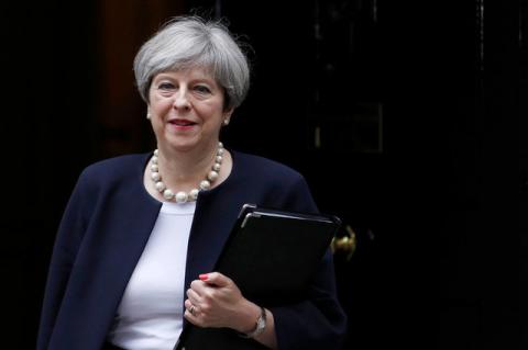 Britain's Prime Minister Theresa May leaves Downing Street, London, Britain, July 11, 2017. PHOTO BY REUTERS/Peter Nicholls