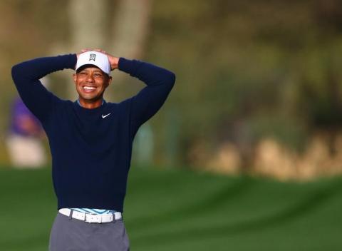 Tiger Woods smiles during a practice round at TPC Scottsdale. PHOTO BY USA TODAY: Mark J. Rebilas