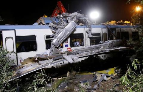 One of the two passenger trains collided in the middle of an olive grove is seen in the southern village of Corato, near Bari, Italy, July 12, 2016. PHOTO BY REUTERS/Alessandro Garofalo