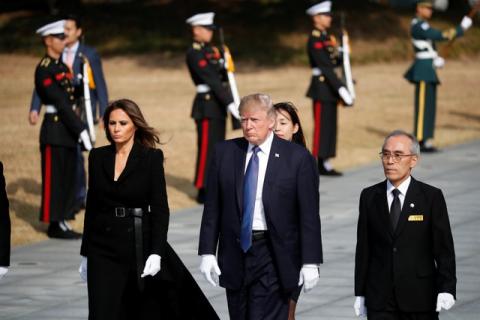 U.S. President Donald Trump and first lady Melania Trump arrive at the National Cemetery in Seoul, South Korea, November 8, 2017. PHOTO BY REUTERS/Kim Hong-Ji