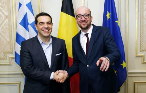 Belgian Prime Minister Charles Michel poses with his Greek counterpart Alexis Tsipras (L) ahead of a meeting in Brussels, February 12, 2015. PHOTO BY REUTERS/Francois Lenoir