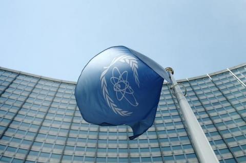 The flag of the International Atomic Energy Agency (IAEA) flies in front of its headquarters in Vienna, Austria, May 28, 2015. PHOTO BY REUTERS/Heinz-Peter Bader