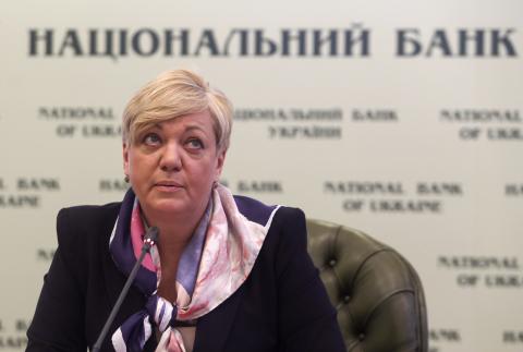 Valeria Gontareva, the head of Ukraine's Central Bank, attends a news conference in Kiev, December 30, 2014. PHOTO BY REUTERS/Konstantin Grishin