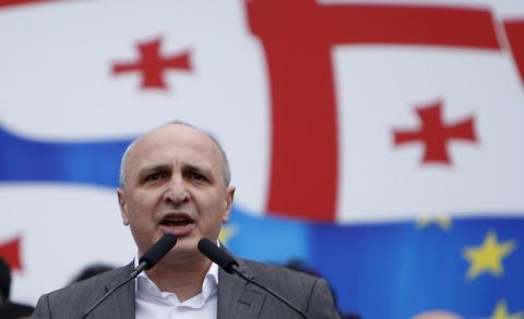 Vano Merabishvili, leader of opposition United National Movement party, addresses people during a rally in Tbilisi