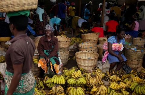 Street vendors wait for customers at a makeshift stall in Mbare township outside Harare, Zimbabwe, November 27, 2017. PHOTO BY REUTERS/Siphiwe Sibeko