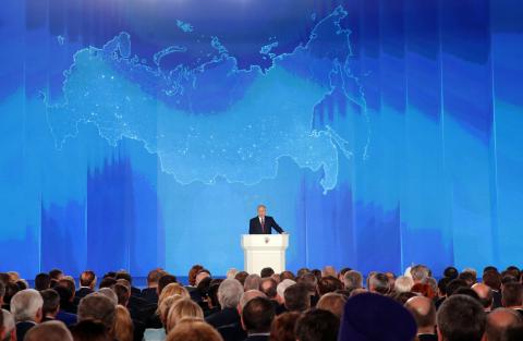 Russian President Vladimir Putin addresses the Federal Assembly, including the State Duma parliamentarians, members of the Federation Council, regional governors and other high-ranking officials, in Moscow, Russia, March 1, 2018. PHOTO BY REUTERS/Maxim Shemetov