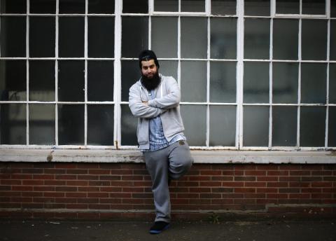 Waseem Iqbal poses for a photograph in Birmingham, central England, November 20, 2014. PHOTO BY REUTERS/Darren Staples