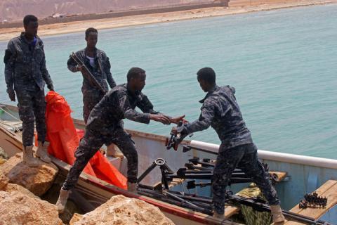 Somali Puntland forces receive weapons seized in a boat on the shores of the Gulf of Aden in the city of Bosasso, Puntland region, Somalia, September 23, 2017. PHOTO BY REUTERS/Abdiqani Hassan
