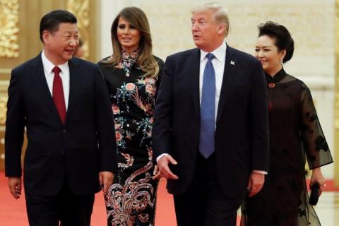 U.S. President Donald Trump and first lady Melania arrive for the state dinner with China's President Xi Jinping and China's first lady Peng Liyuan at the Great Hall of the People in Beijing, China, November 9, 2017. PHOTO BY REUTERS/Jonathan Ernst