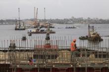 A general view of the construction site of Ivory Coast's third bridge, the Henri Konan Bedie, named after the country's former president, is seen in Abidjan, February 13, 2014. PHOTO BY REUTERS/Thierry Gouegnon