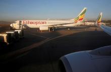Workers service an Ethiopian Airlines plane at the Bole International Airport in Ethiopia's capital Addis Ababa, January 26, 2017. PHOTO BY REUTERS/Amr Abdallah Dalsh