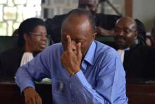 Ex-army chief and opposition presidential candidate Jean-Marie Michel Mokoko reacts during his trial at a court in Brazzaville, Democratic Republic of the Congo, May 11, 2018. PHOTO BY REUTERS/Roch Bouka