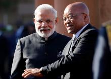 South Africa's President Jacob Zuma gestures next to India's Prime Minister Narendra Modi (L) during his state visit at the Union Buildings in Pretoria, South Africa, July 8, 2016. PHOTO BY REUTERS/Siphiwe Sibeko