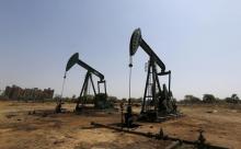 Oil and Natural Gas Corp's (ONGC) wells in an oil field on the outskirts of the western city of Ahmedabad, India, March 16, 2016. PHOTO BY REUTERS/Amit Dave