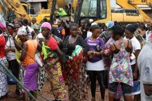 Victims of the mudslide are seen gathered in a queue at an internally displaced persons (IDP) camp in Regent, Sierra Leone,August 21, 2017. PHOTO BY REUTERS/Afolabi Sotunde