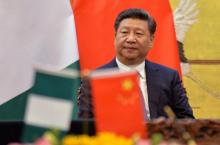 Chinese President, Xi Jinping attends a signing ceremony with President of the Federal Republic of Nigeria, Muhammadu Buhari (not pictured) at the Great Hall of the People in Beijing, April 12, 2016. PHOTO BY REUTERS/Kenzaburo Fukuhara