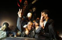 A released Palestinian prisoner reacts upon his arrival at the Erez crossing between Israel and the northern Gaza Strip