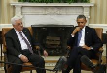 U.S. President Barack Obama meets with Palestinian Authority President Mahmoud Abbas (L) at the White House in Washington, March 17, 2014. PHOTO BY REUTERS/Kevin Lamarque