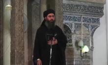 A man purported to be the reclusive leader of the militant Islamic State Abu Bakr al-Baghdadi has made what would be his first public appearance at a mosque in the centre of Iraq's second city, Mosul, according to a video recording posted on the Internet on July 5, 2014, in this still image taken from video. PHOTO BY REUTERS/Social Media Website