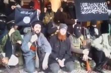 A still image taken on July 14, 2016 from an undated video posted on social media, shows Islamic State senior operative Abu Omar al-Shishani (C) sitting with fighters in an unknown location. PHOTO BY REUTERS/Social Media