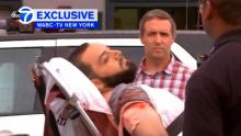 A still image captured from a video from WABC television shows a conscious man believed to be New York bombing suspect Ahmad Khan Rahami being loaded into an ambulance after a shoot-out with police in Linden, New Jersey, U.S., September 19, 2016. PHOTO BY REUTERS/WABC-TV via REUTERS