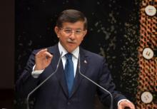Turkish Prime Minister Ahmet Davutoglu addresses his AK Party local officials at the party headquarters in Ankara, Turkey, June 11, 2015. PHOTO BY REUTERS/Stringer