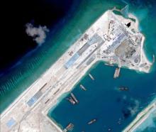Airstrip construction on the Fiery Cross Reef in the South China Sea is pictured in this April 2, 2015 handout satellite image obtained by Reuters on April 16, 2015. REUTERS/CSIS Asia Maritime Transparency Initiative