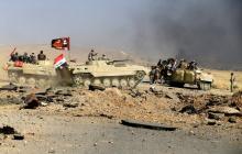 Members of Iraqi Army are seen during the war between Iraqi army and Shi'ite Popular Mobilization Forces (PMF) against the Islamic State militants in al-'Ayadiya, northwest of Tal Afar, Iraq, August 28, 2017. PHOTO BY REUTERS/Thaier Al-Sudani