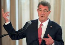 Visiting U.S. Defense Secretary Ash Carter gestures during a joint press conference with his Filipino counterpart Voltaire Gazmin (not pictured) at the presidential palace in Manila, April 14, 2016. PHOTO BY REUTERS/Romeo Ranoco