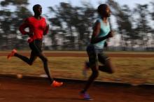 Athletes exercise in the early morning in the sports ground of the University of Eldoret in western Kenya, March 21, 2016. PHOTO BY REUTERS/Siegfried Modola