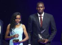 Usain Bolt of Jamaica (R) and Almaz Ayana of Ethiopia pose with their awards after being elected male and female World Athlete of the Year 2016 in Monaco, December 2, 2016. PHOTO BY REUTERS/Eric Gaillard