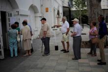People wait in line to cast their ballots during the EU referendum at a polling station in the British overseas territory of Gibraltar, historically claimed by Spain. PHOTO BY REUTERS/Jon Nazca
