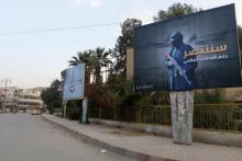 Islamic State billboards are seen along a street in Raqqa, eastern Syria, which is controlled by the Islamic State, October 29, 2014. PHOTO BY REUTERS/Nour Foura