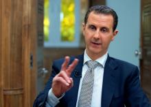Syria's President Bashar al-Assad speaks during an interview with AFP news agency in Damascus, Syria in this handout picture provided by SANA on April 13, 2017. PHOTO BY REUTERS/SANA