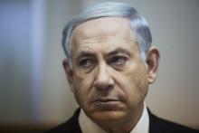 Israel's Prime Minister Benjamin Netanyahu attends the weekly cabinet meeting at his office in Jerusalem, February 15, 2015. PHOTO BY REUTERS/Abir Sultan