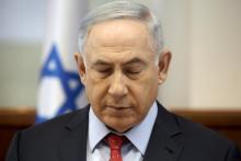 Israeli Prime Minister Benjamin Netanyahu closes his eyes during the weekly cabinet meeting in Jerusalem, April 10, 2016. PHOTO BY REUTERS/Gali Tibbon