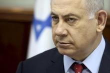 Israeli Prime Minister Benjamin Netanyahu looks on as he opens the weekly cabinet meeting in Jerusalem, April 10, 2016. PHOTO BY REUTERS/Gali Tibbon