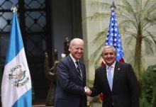 File photo of U.S. Vice-President Joe Biden (L) and Guatemala's then-president Otto Perez Molina shaking hands during a photo opportunity at the Presidential Palace in Guatemala City, March 2, 2015. PHOTO BY REUTERS/Jorge Dan Lopez