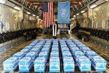 United Nations Command Chaplain U.S. Army Col. Sam Lee performs a blessing of sacrifice and remembrance on the 55 boxes of remains thought to be of U.S. soldiers killed in the 1950-53 Korean War, returned by North Korea to the U.S., at the Osan Air Base in South Korea, July 27, 2018. PHOTO BY REUTERS/U.S. Army/Sgt. Quince Lanford